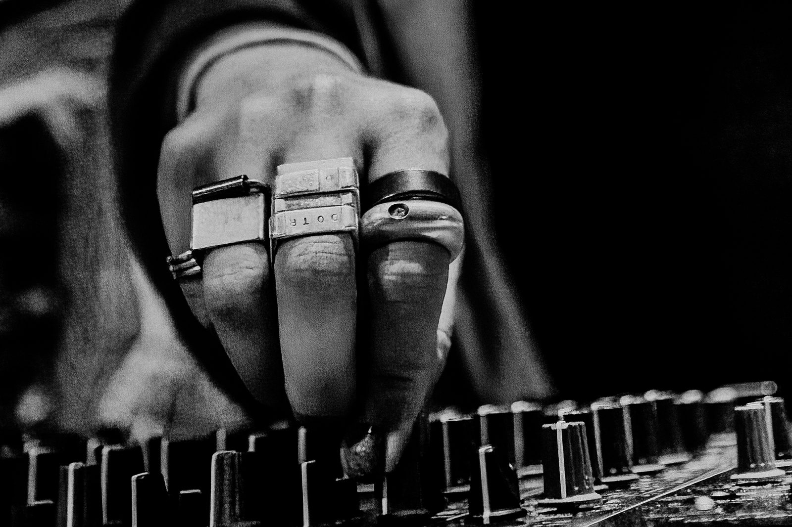LP Giobbi wearing CMD rings while DJing during The Way Back Home Tour