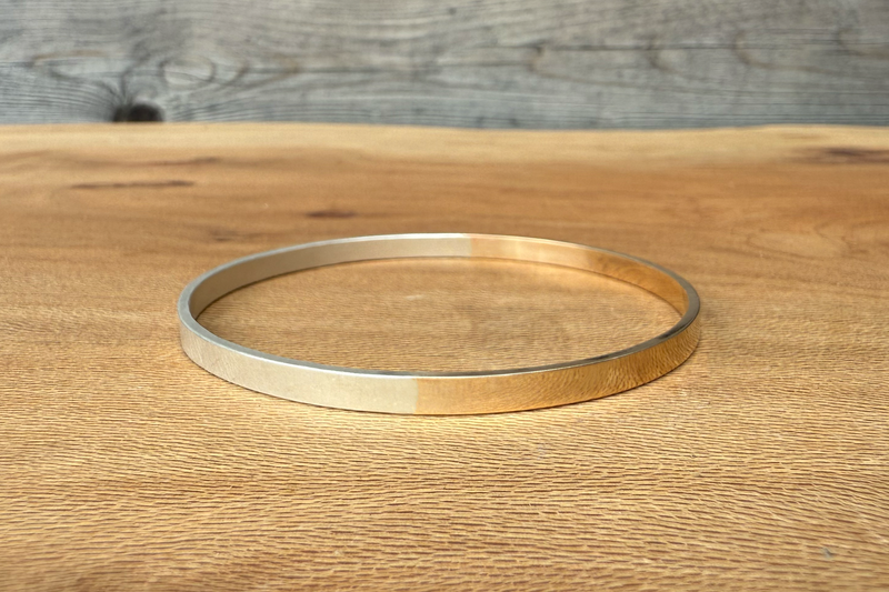 Two-Toned Evolution Bangle Bracelet