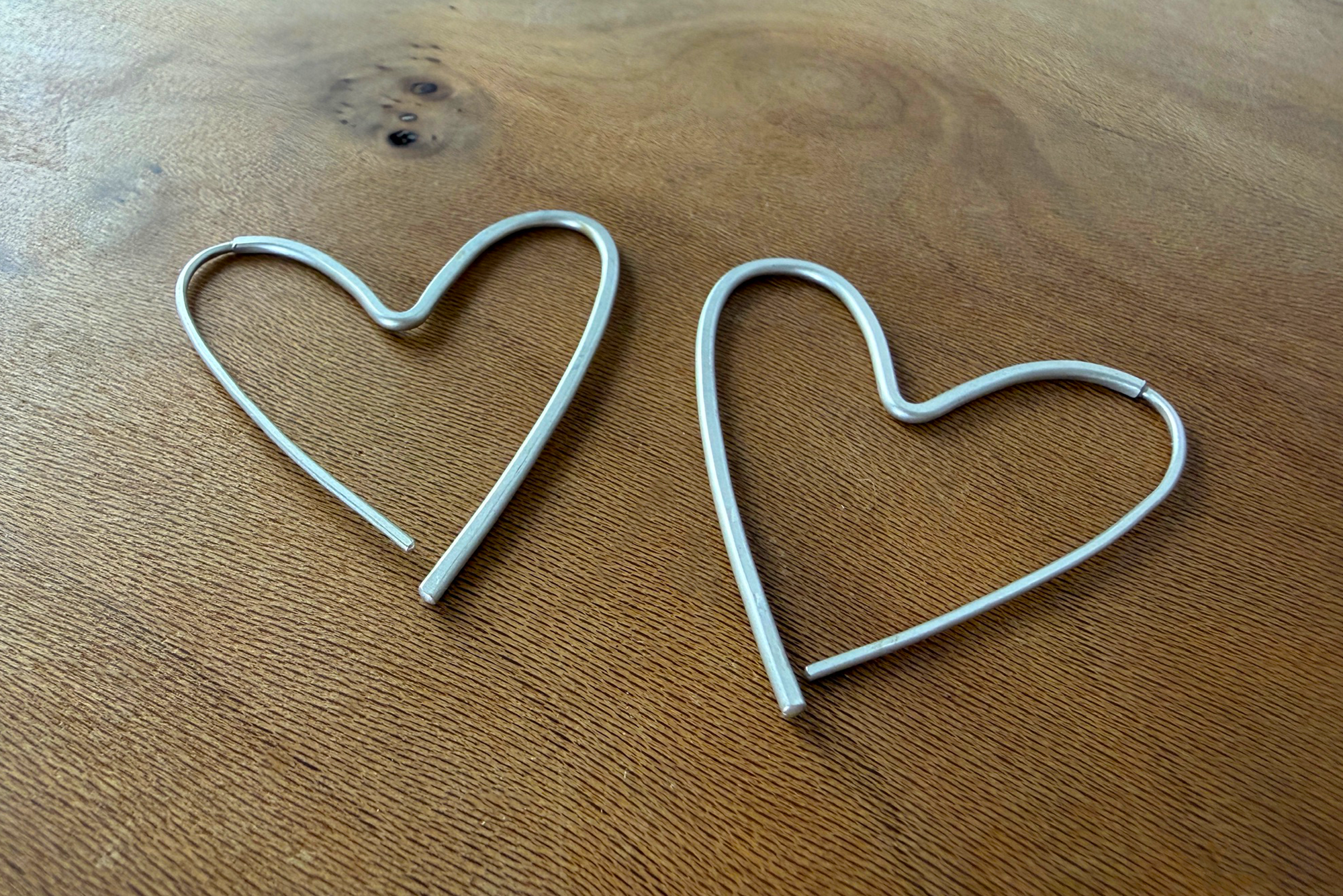 Continuous Heart Pull-Through Hoop Earrings