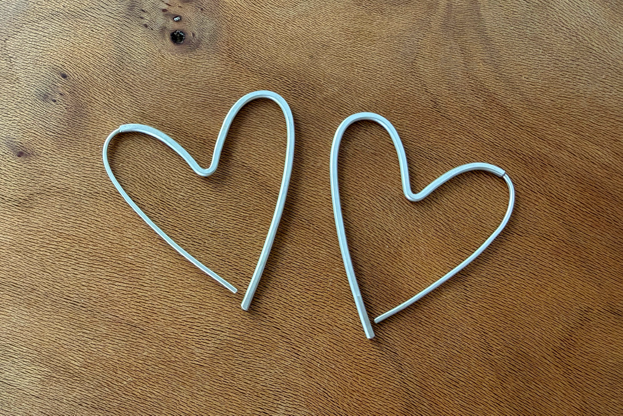 Continuous Heart Pull-Through Hoop Earrings