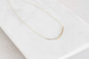 N276g.yg Mini Yellow Gold and Silver Inflecto Necklace on Yellow Gold Chain - Lifestyle Image
