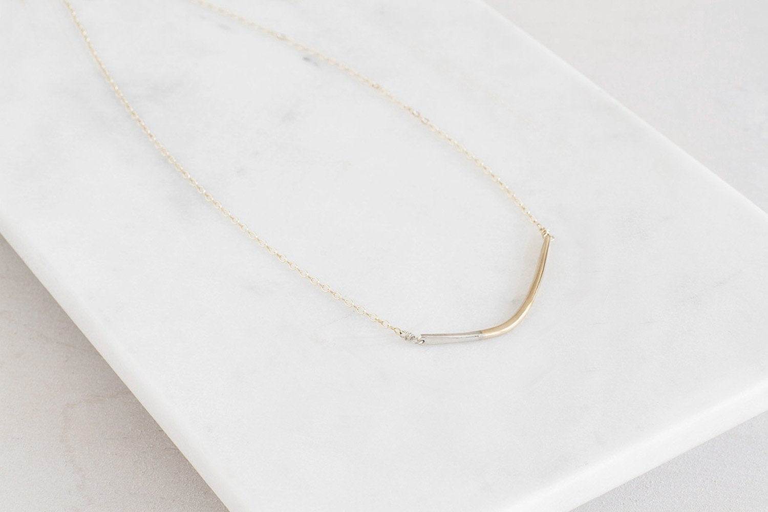N276g.yg Mini Yellow Gold and Silver Inflecto Necklace on Yellow Gold Chain - Lifestyle Image