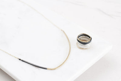 N277x.yg Black and Gold Inflecto Necklace - Lifestyle Image