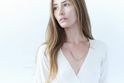 N277x.yg Black and Gold Inflecto Necklace - Model Image