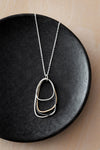 N300s.rg Silver, Rose Gold and Black Multi Triangle Necklace on Sterling Silver Chain - Lifestyle Image