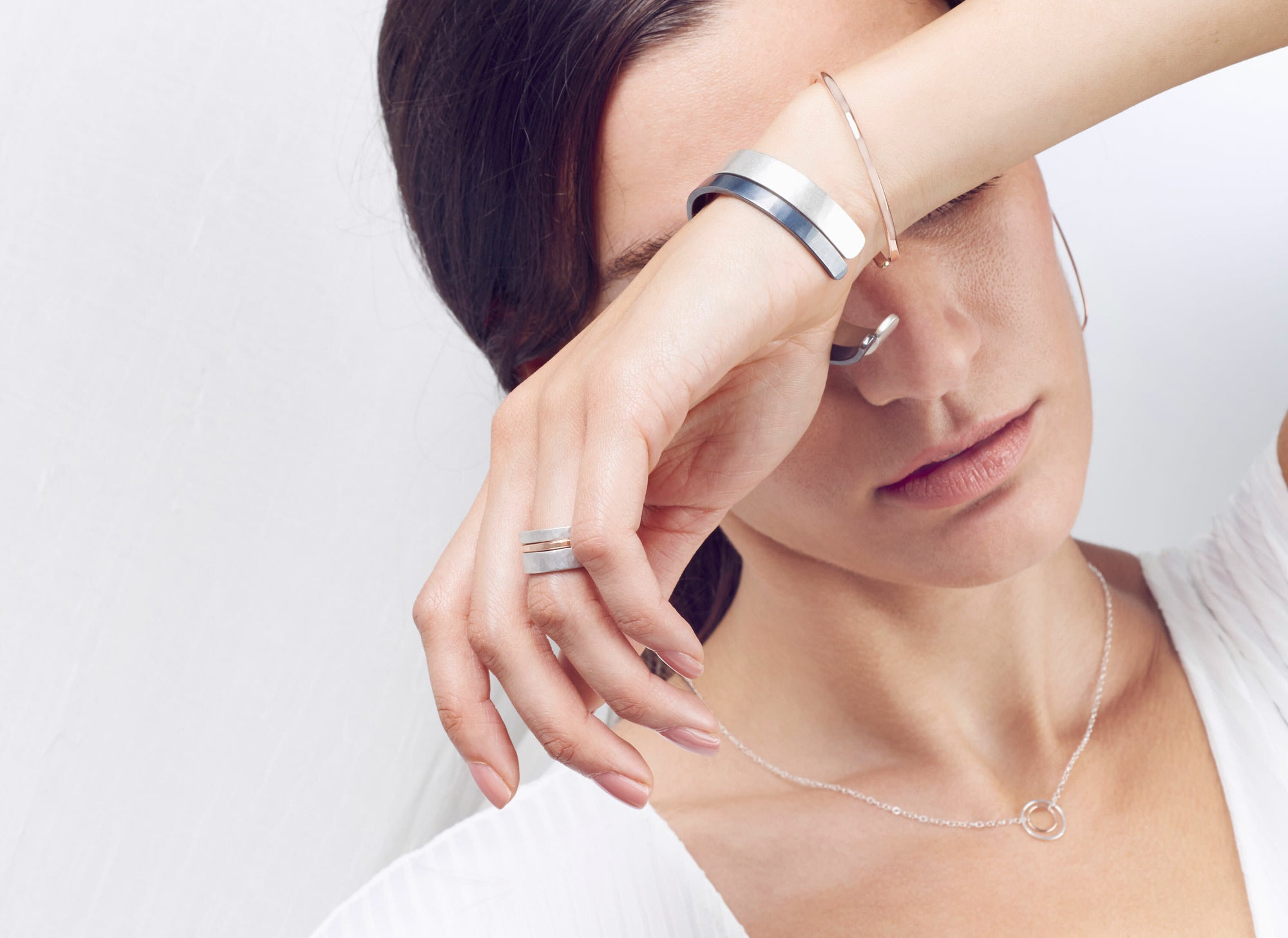 R37.RND 3-Stack Two-Toned Round Densa Ring Set in Silver and Yellow Gold